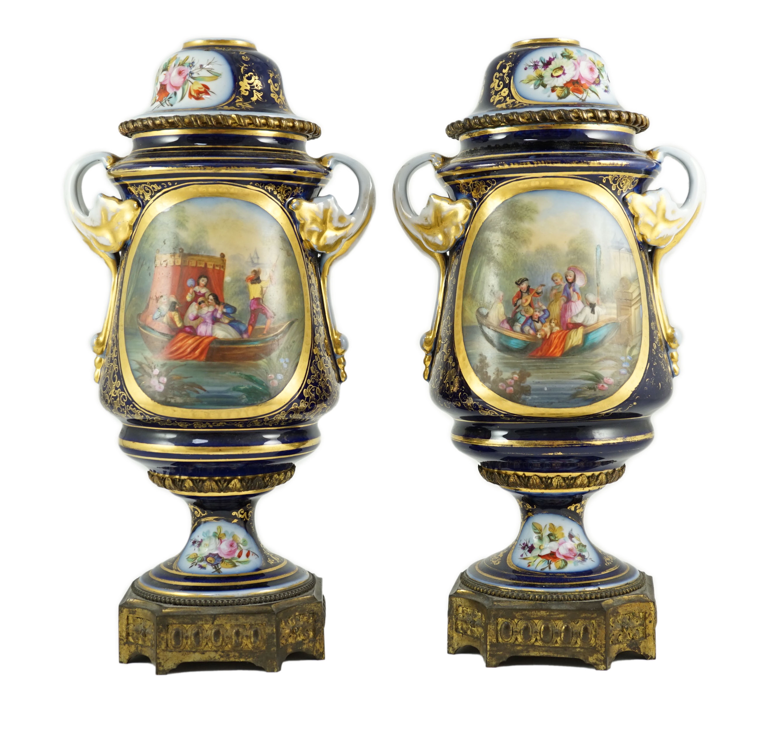 A pair of Sevres style Paris porcelain and ormolu mounted oil lamps, late 19th century, 43 cm high